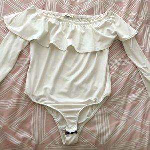 Off the shoulder body suit.